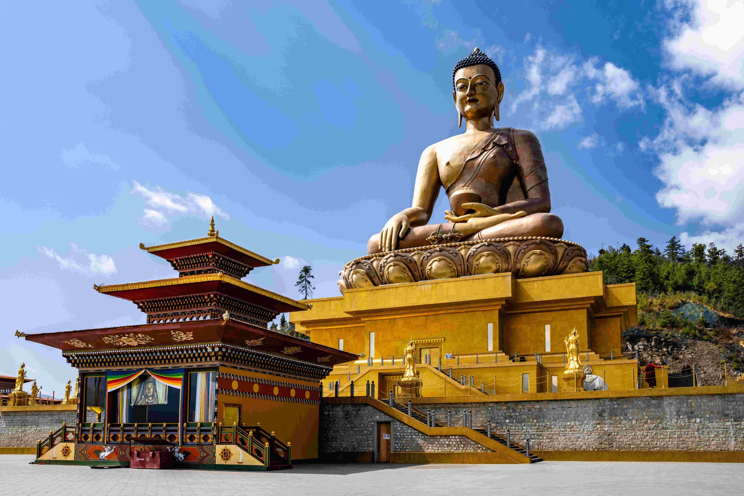 Majestic Buddha Dordenma Statue against the Background of a Blue Sky. Bhutan